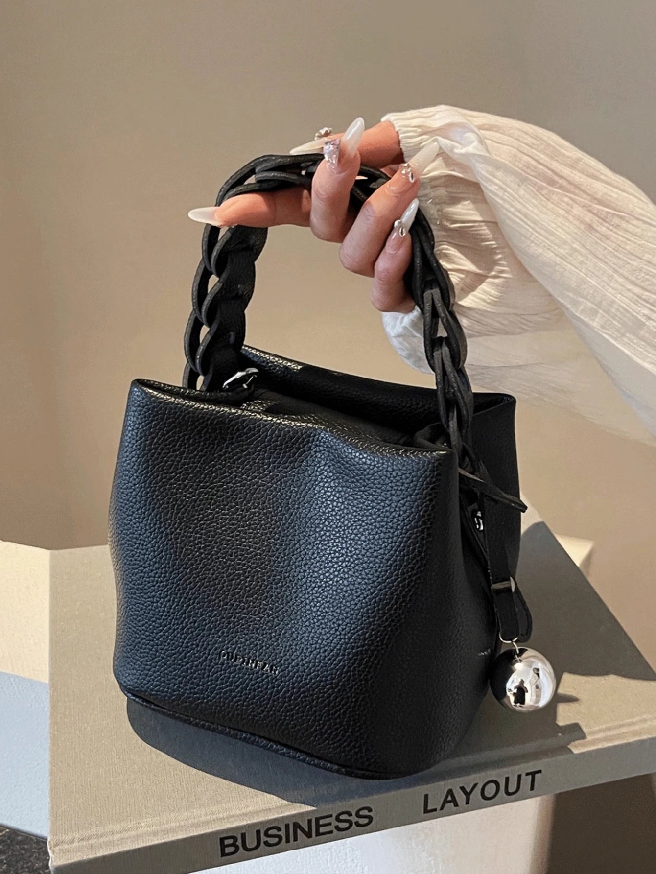 Fashion Joker pu waterproof fabric, letter pattern design, metal pendant decoration design portable square bag, preparation of p