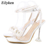 Eilyken New Women Sandals 2025 Summer Sexy Perspex Crystal High Heels Party Wedding Shoes Square Toe Pearls String Bowknot Pumps
