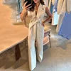 Boutique Wholesale 2026 Summer New Fashion Polo Neck Tie Waist Solid Color Wide Leg Women's Jumpsuit