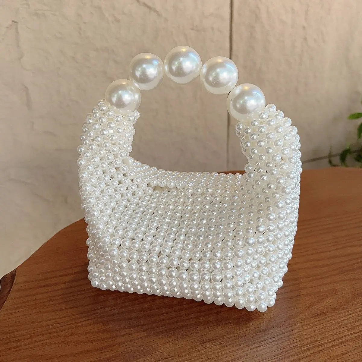 European and American style new beaded handbag Summer women's pearl bag hand woven wrist bag Fashion temperament handbag