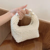European and American style new beaded handbag Summer women's pearl bag hand woven wrist bag Fashion temperament handbag