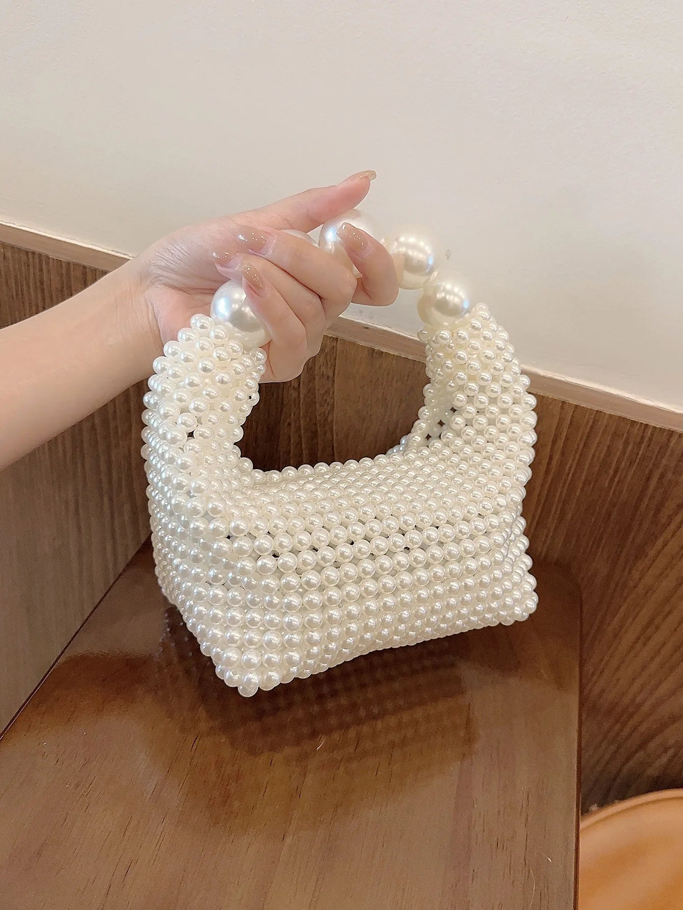 European and American style new beaded handbag Summer women's pearl bag hand woven wrist bag Fashion temperament handbag