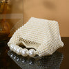 European and American style new beaded handbag Summer women's pearl bag hand woven wrist bag Fashion temperament handbag