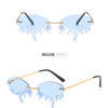 New personalised rimless sunglasses male Europe and the United States prom weird trend of irregular tears sunglasses female