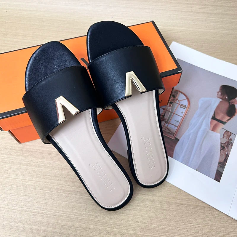 2024 summer new V-shaped metal decoration flat bottomed beach women's fashionable slippers
