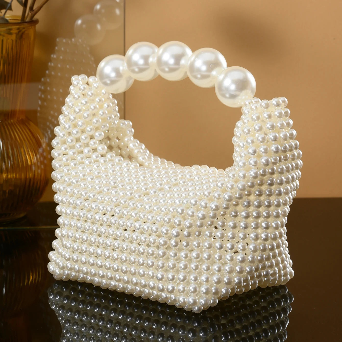 European and American style new beaded handbag Summer women's pearl bag hand woven wrist bag Fashion temperament handbag