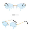 New personalised rimless sunglasses male Europe and the United States prom weird trend of irregular tears sunglasses female