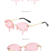 New personalised rimless sunglasses male Europe and the United States prom weird trend of irregular tears sunglasses female