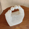 European and American style new beaded handbag Summer women's pearl bag hand woven wrist bag Fashion temperament handbag