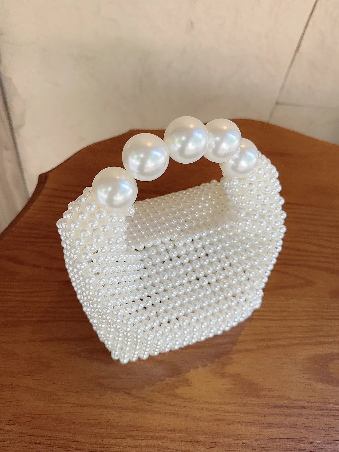 European and American style new beaded handbag Summer women's pearl bag hand woven wrist bag Fashion temperament handbag