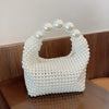 European and American style new beaded handbag Summer women's pearl bag hand woven wrist bag Fashion temperament handbag