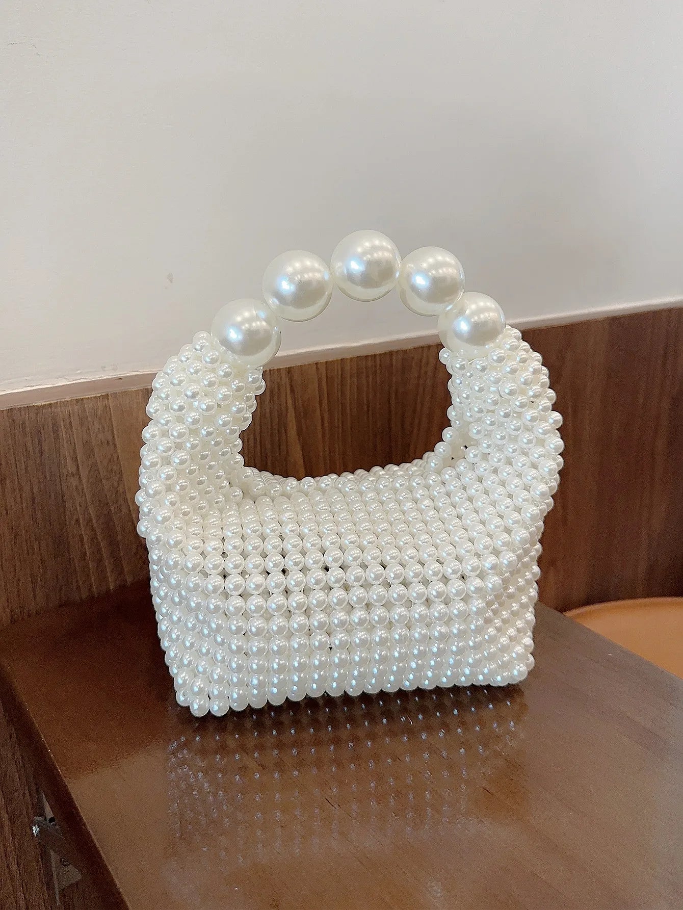 European and American style new beaded handbag Summer women's pearl bag hand woven wrist bag Fashion temperament handbag