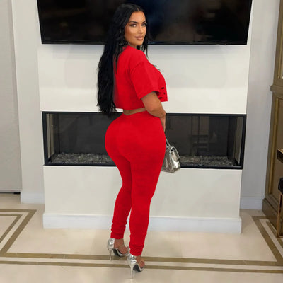 Spring Summer Fashion Solid Two Piece Set Women Sexy Perforated Round Neck Short Sleeve Top Tight Pants Casual Two Piece Set